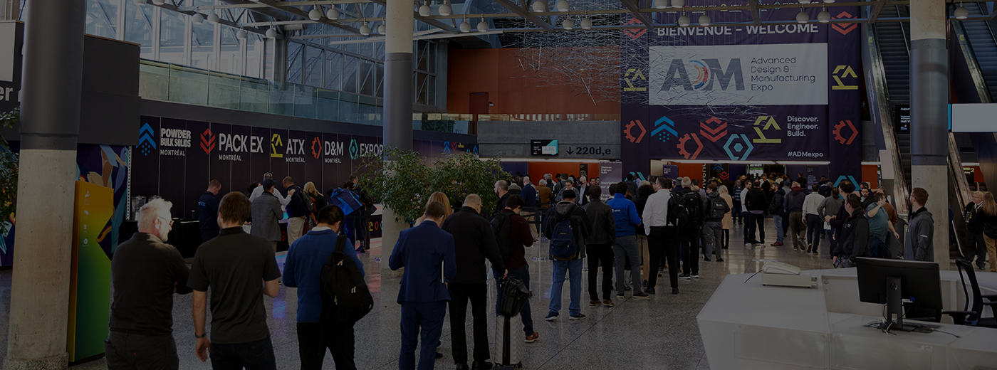 Attendees in lines to print badge to enter expo